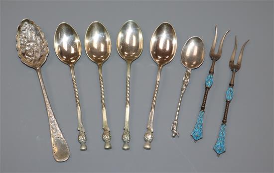 A pair of Norwegian silver 925 and cloisonne enamel sweetmeat forks and five assorted plated spoons.